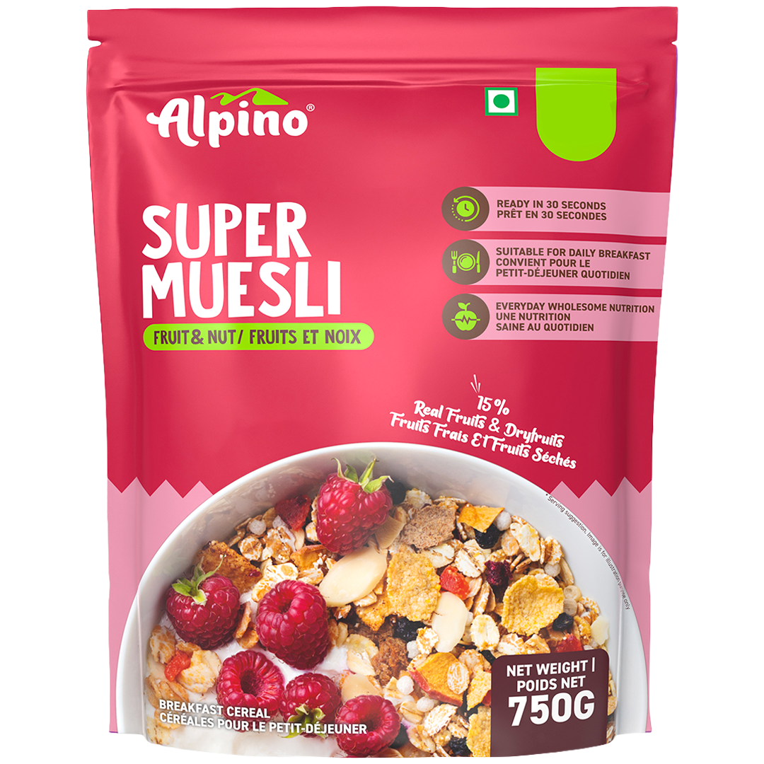 Alpino Super Muesli breakfast cereal in a 750g bag. The packaging is bright pink with green accents, featuring a bowl of prepared muesli with strawberries, nuts, and oats on the front.